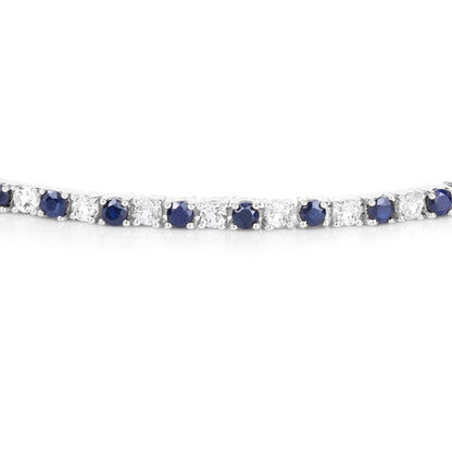 6.87 ct. t.w. Blue Sapphire and White Topaz Bracelet in Sterling Silver Bids.com