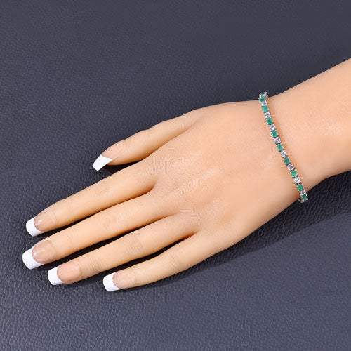5.77 Carat Genuine Emerald and White Topaz .925 Sterling Silver Bracelet Bids.com