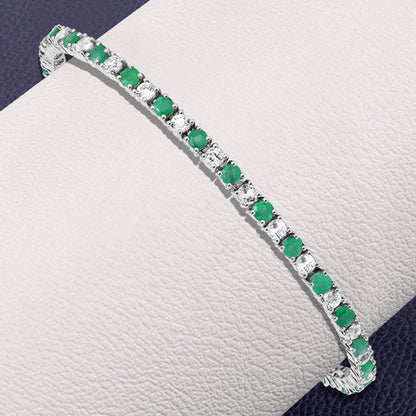 5.77 Carat Genuine Emerald and White Topaz .925 Sterling Silver Bracelet Bids.com