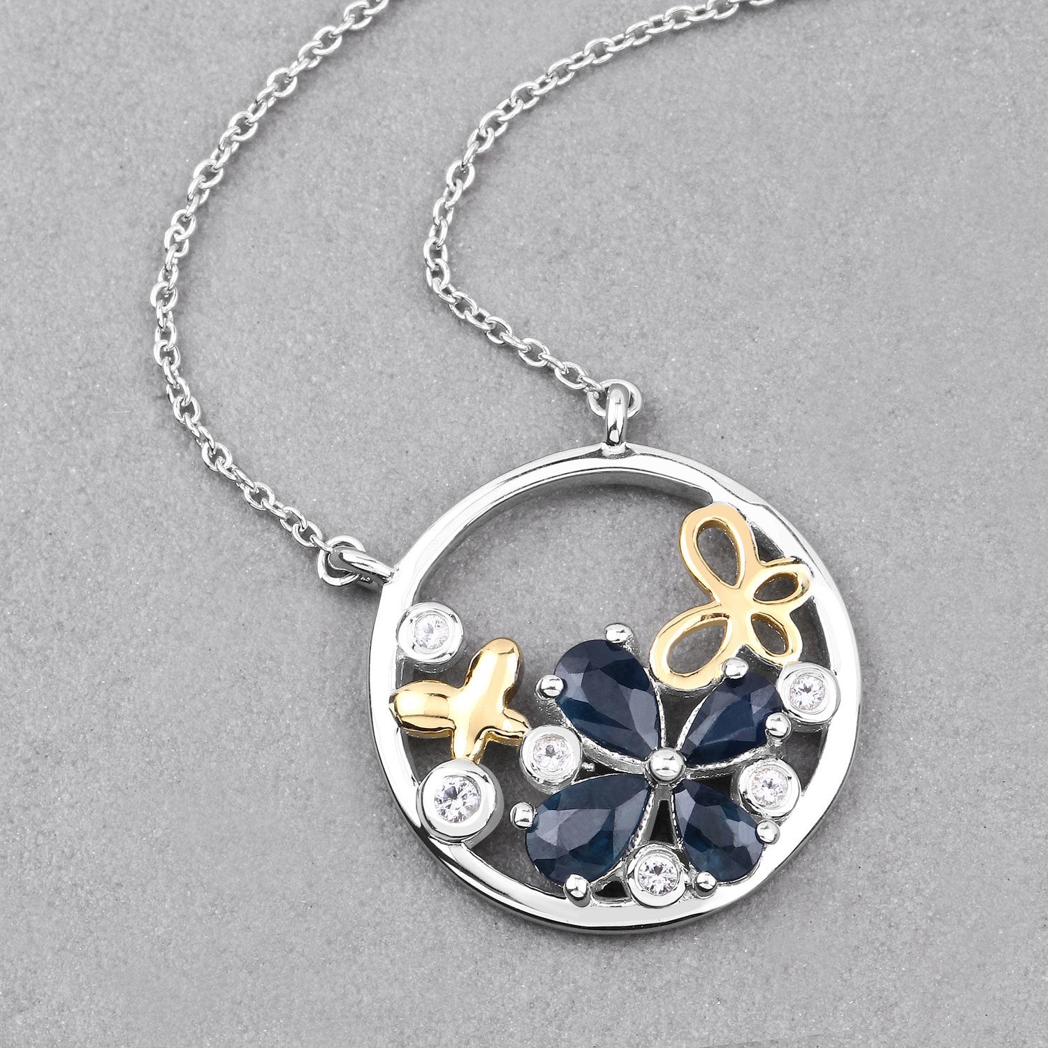 1.41 Carat Genuine Blue Sapphire and White Topaz .925 Sterling Silver Pendant Bids.com