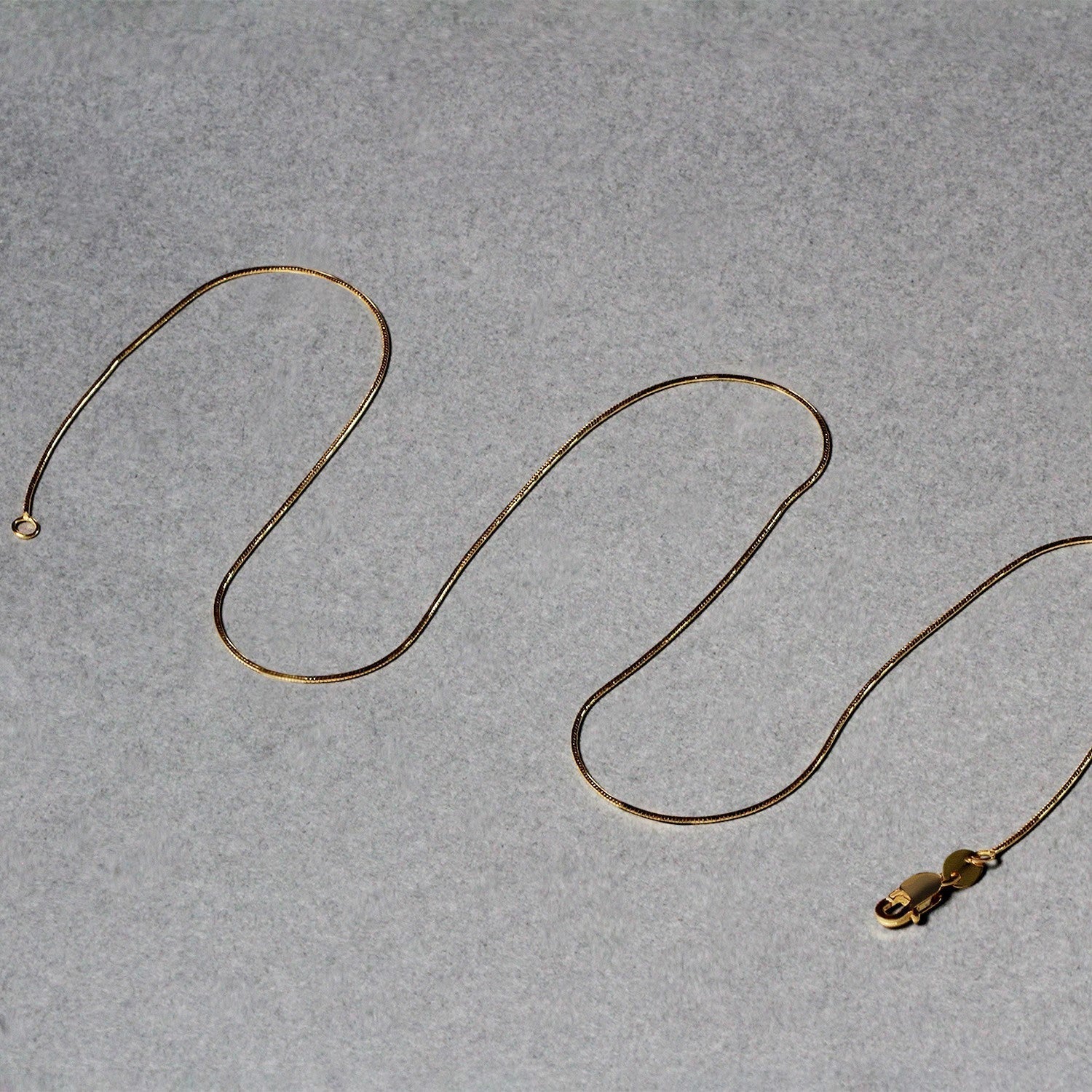 14k Yellow Gold Round Snake Chain 0.7mm Bids.com