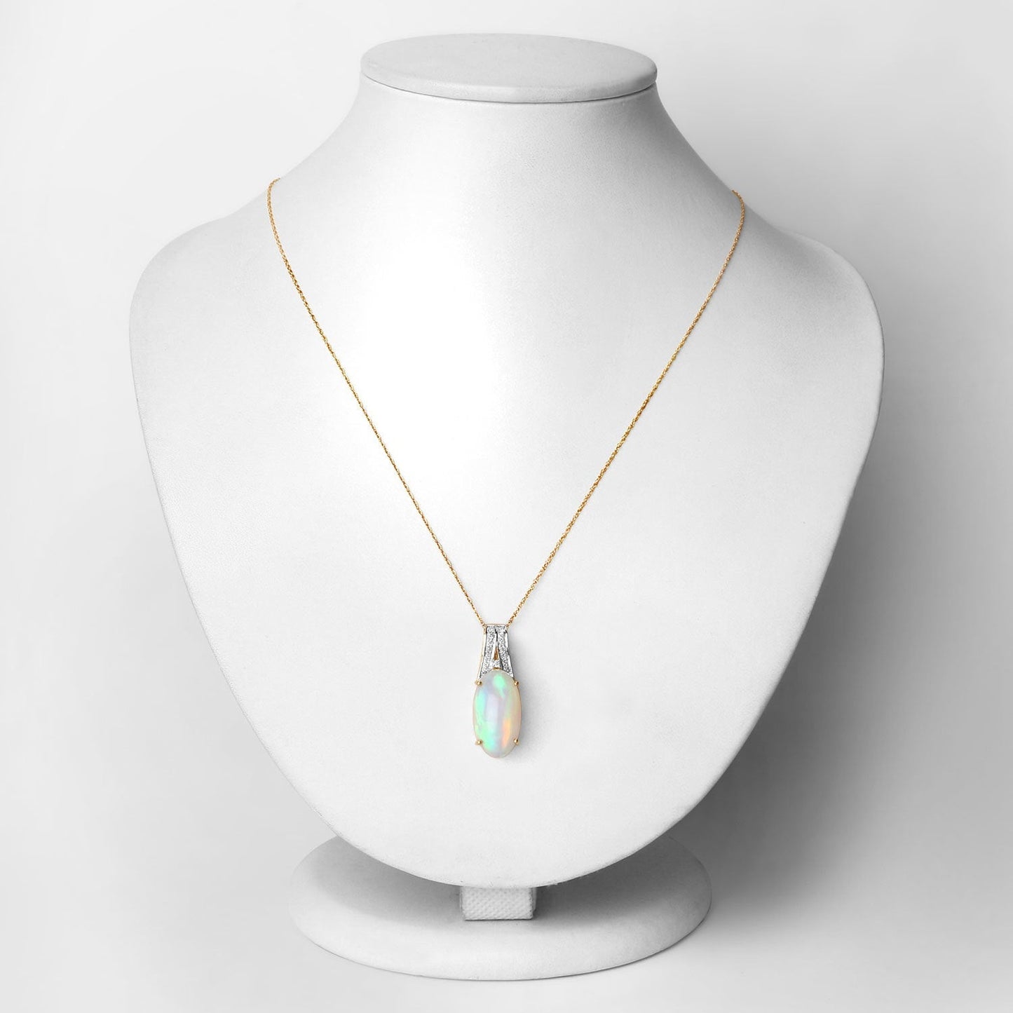 7.57 Carat Genuine Ethiopian Opal and White Diamond 14K Yellow Gold Pendant Bids.com