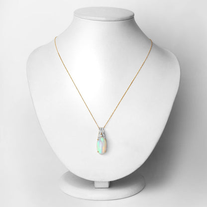 7.57 Carat Genuine Ethiopian Opal and White Diamond 14K Yellow Gold Pendant Bids.com