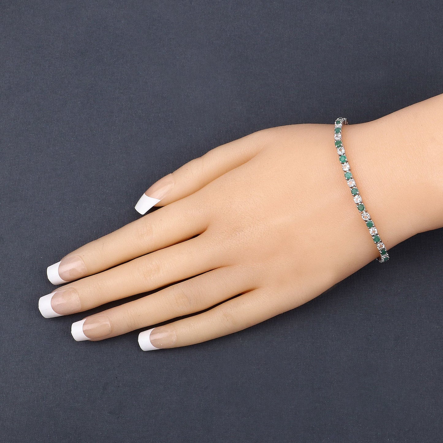 5.77 Carat Genuine Emerald and White Topaz .925 Sterling Silver Bracelet Bids.com