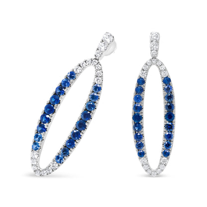 18K White Gold 1.11 Cttw Blue Round Diamond and Blue Sapphire Openwork Oval Shaped Dangle Earrings (F-G Color, VS1-VS2 Clarity) Bids.com