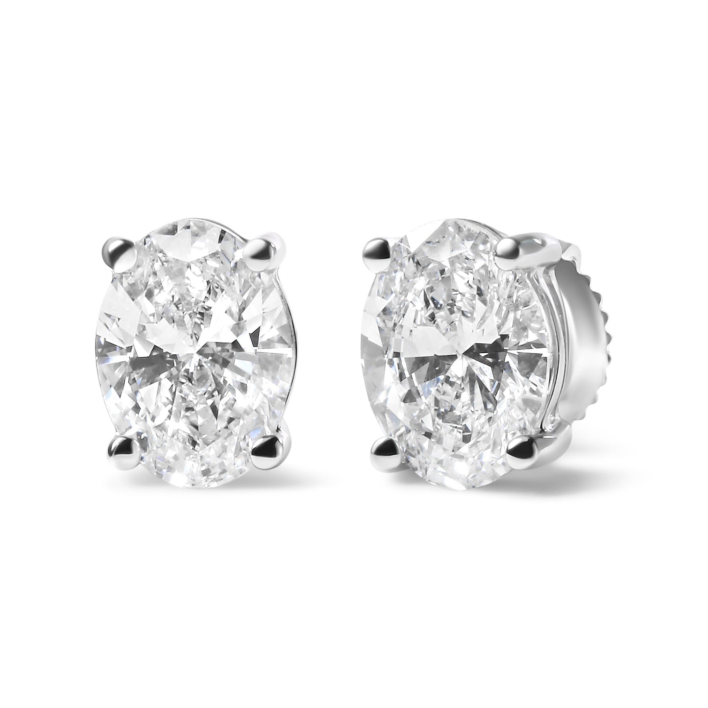 14K White Gold 3/4 Cttw Oval Shape Lab Grown Diamond Solitaire Stud Earrings (F-G Color, VS1-VS2 Clarity) Bids.com
