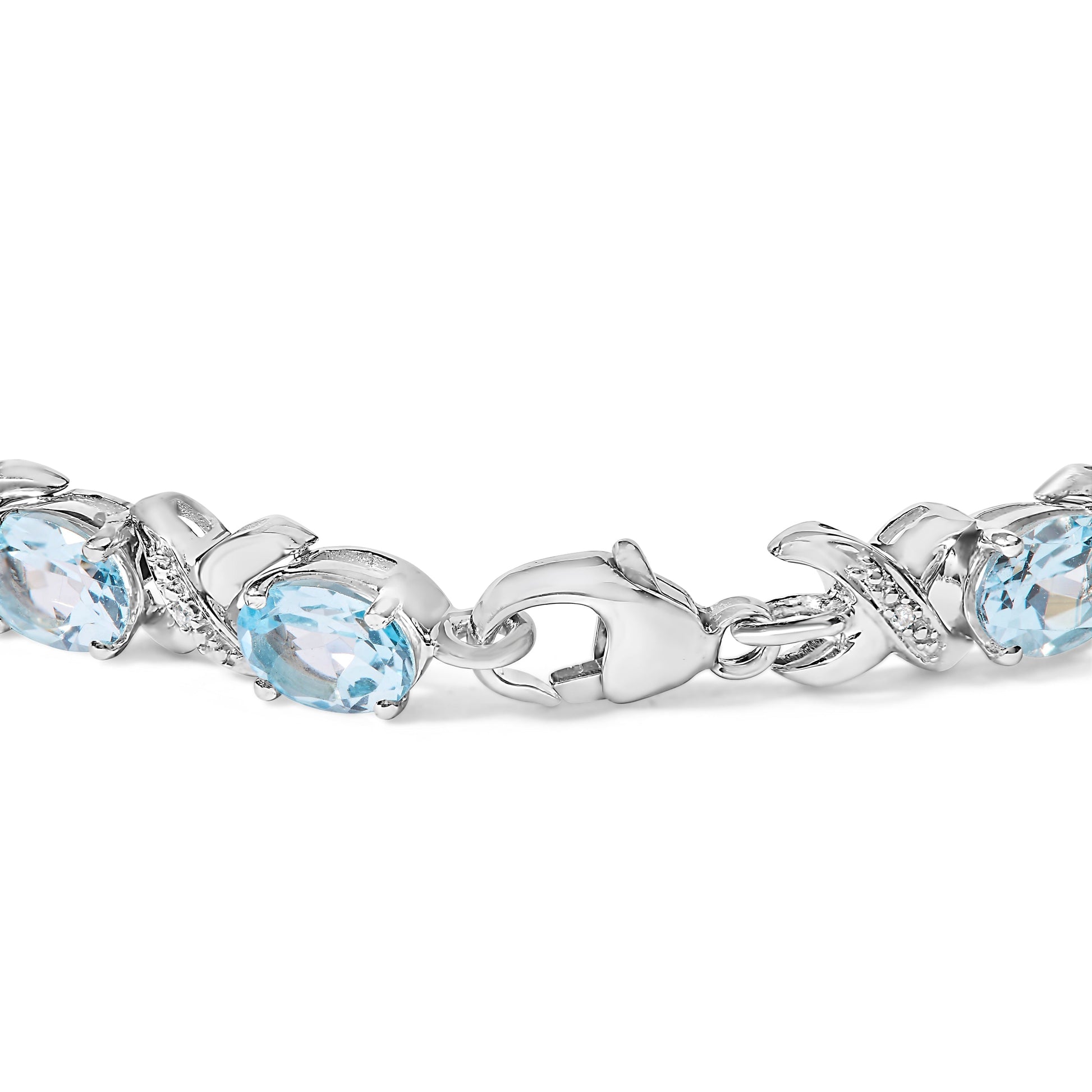 .925 Sterling Silver 16.0 Cttw Oval Blue Topaz and Diamond Accent Tennis X Link Bracelet (I-J Color, I1-I2 Clarity) - Size 7" Inch Bids.com