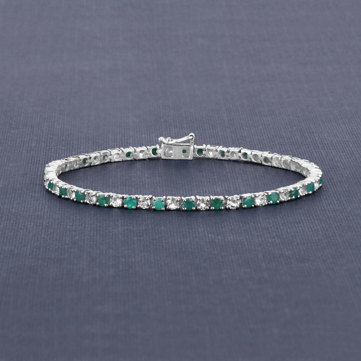 5.77 Carat Genuine Emerald and White Topaz .925 Sterling Silver Bracelet Bids.com