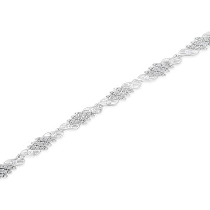 .925 Sterling Silver 1-1/2 Cttw Round and Baguette Cut Diamond Wave Link Bracelet (I-J Color, I2-I3 Clarity) - 7" Bids.com
