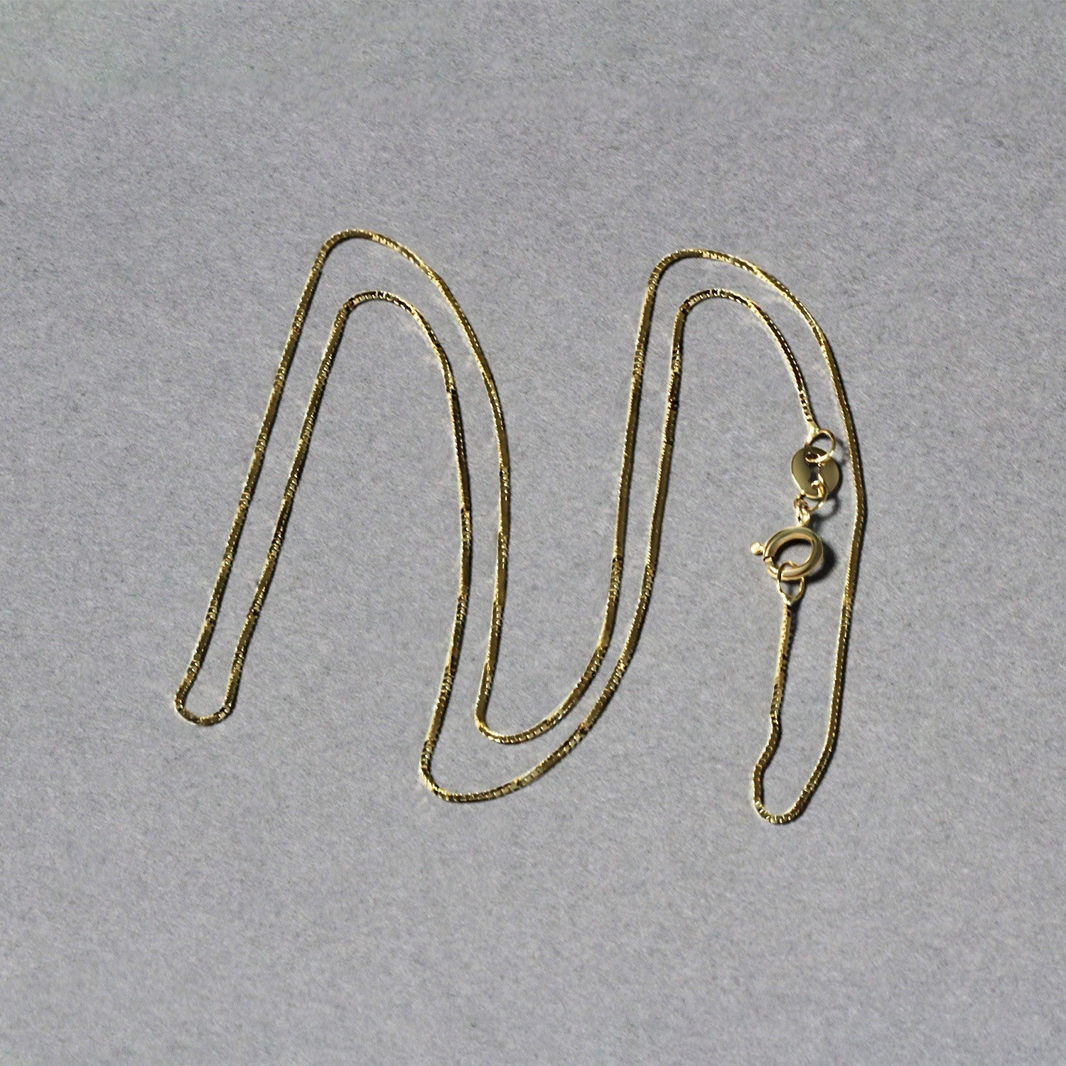 14k Yellow Gold Classic Box Chain 0.6mm Bids.com