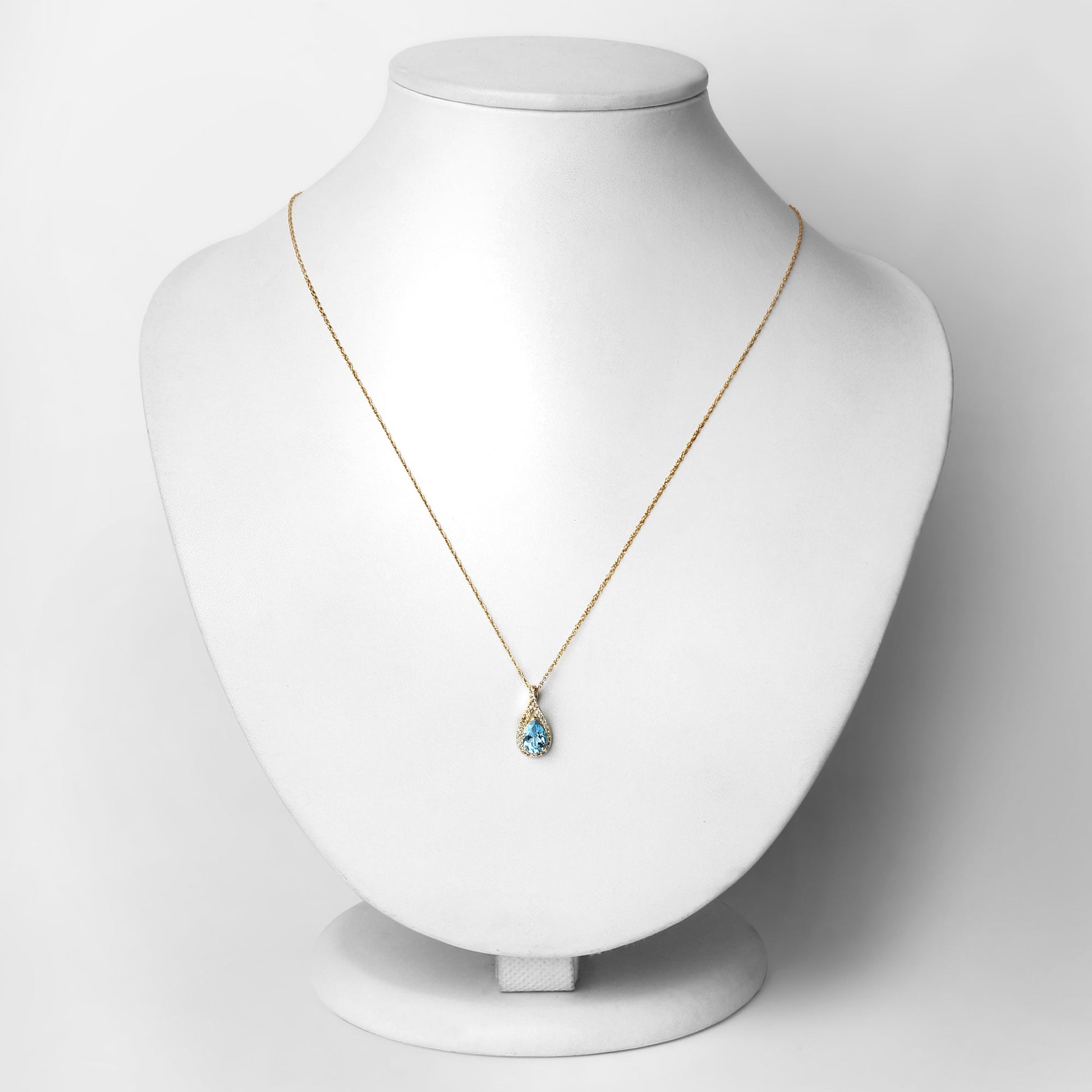 0.89 Carat Genuine Swiss Blue Topaz and White Diamond 14K Yellow Gold Pendant Bids.com