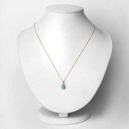 0.89 Carat Genuine Swiss Blue Topaz and White Diamond 14K Yellow Gold Pendant Bids.com