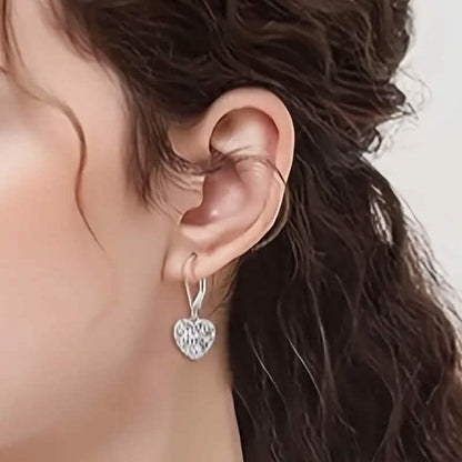 Exquisite Hollow Heart-Shaped Hoop Earrings DailySale