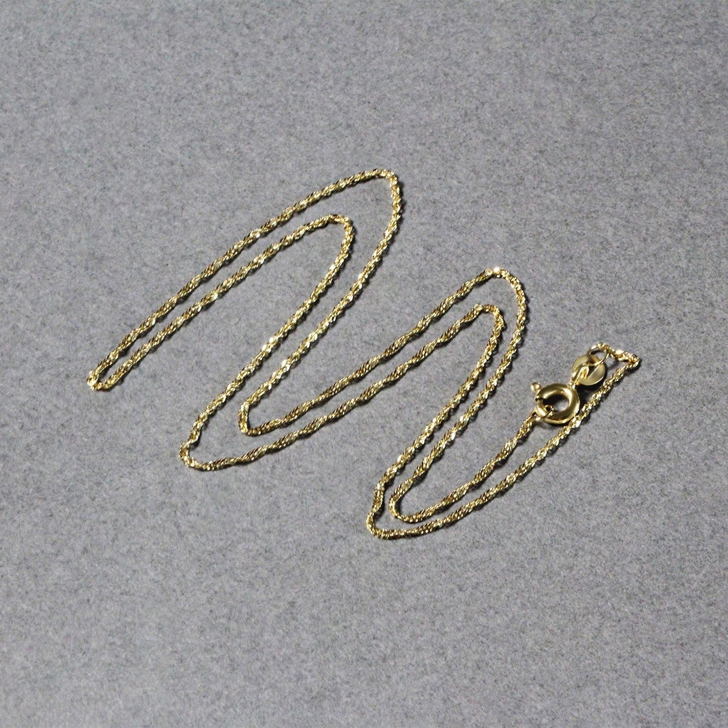 14k Yellow Gold Singapore Chain 1.0mm Bids.com