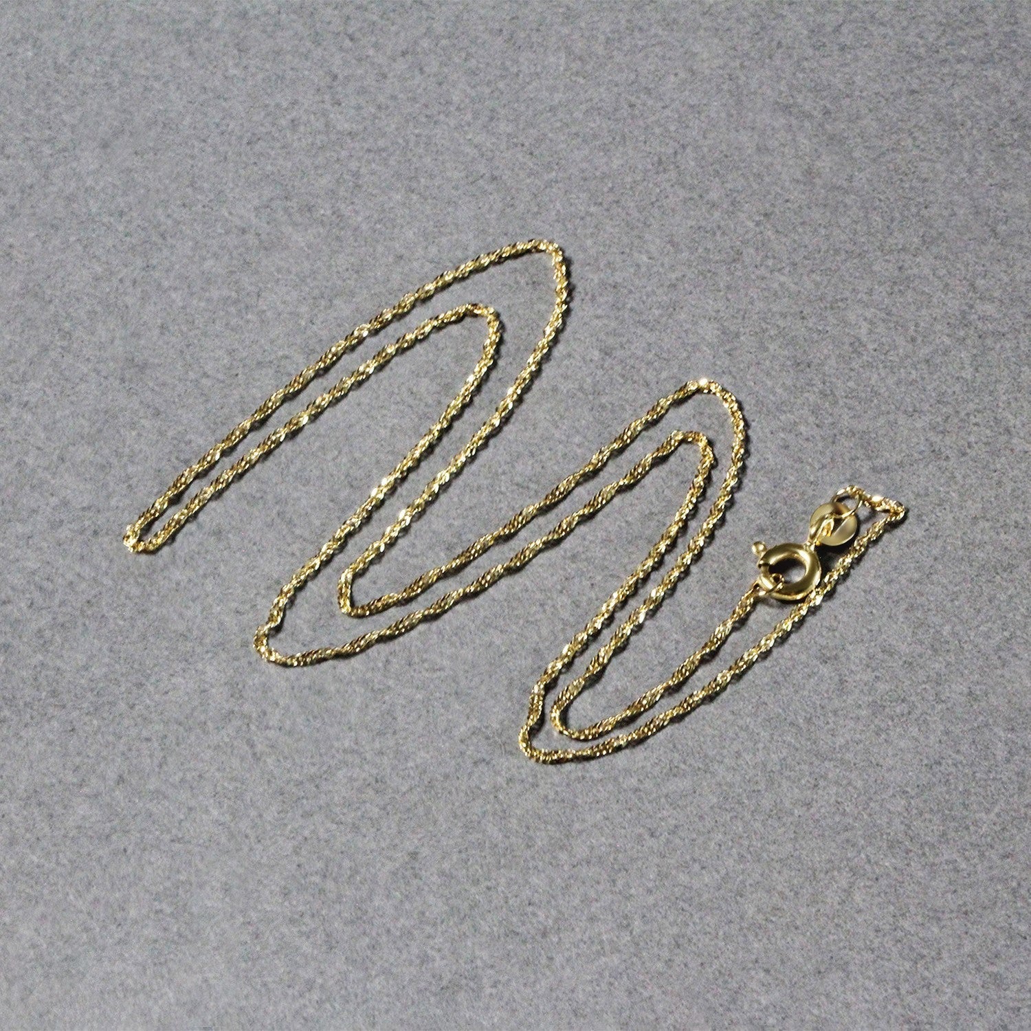 14k Yellow Gold Singapore Chain 1.0mm Bids.com