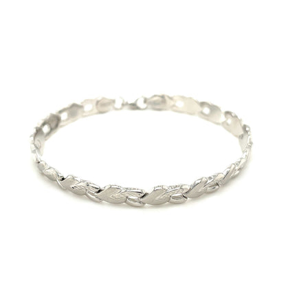 14k White Gold Heart Shape Textured Bracelet Bids.com