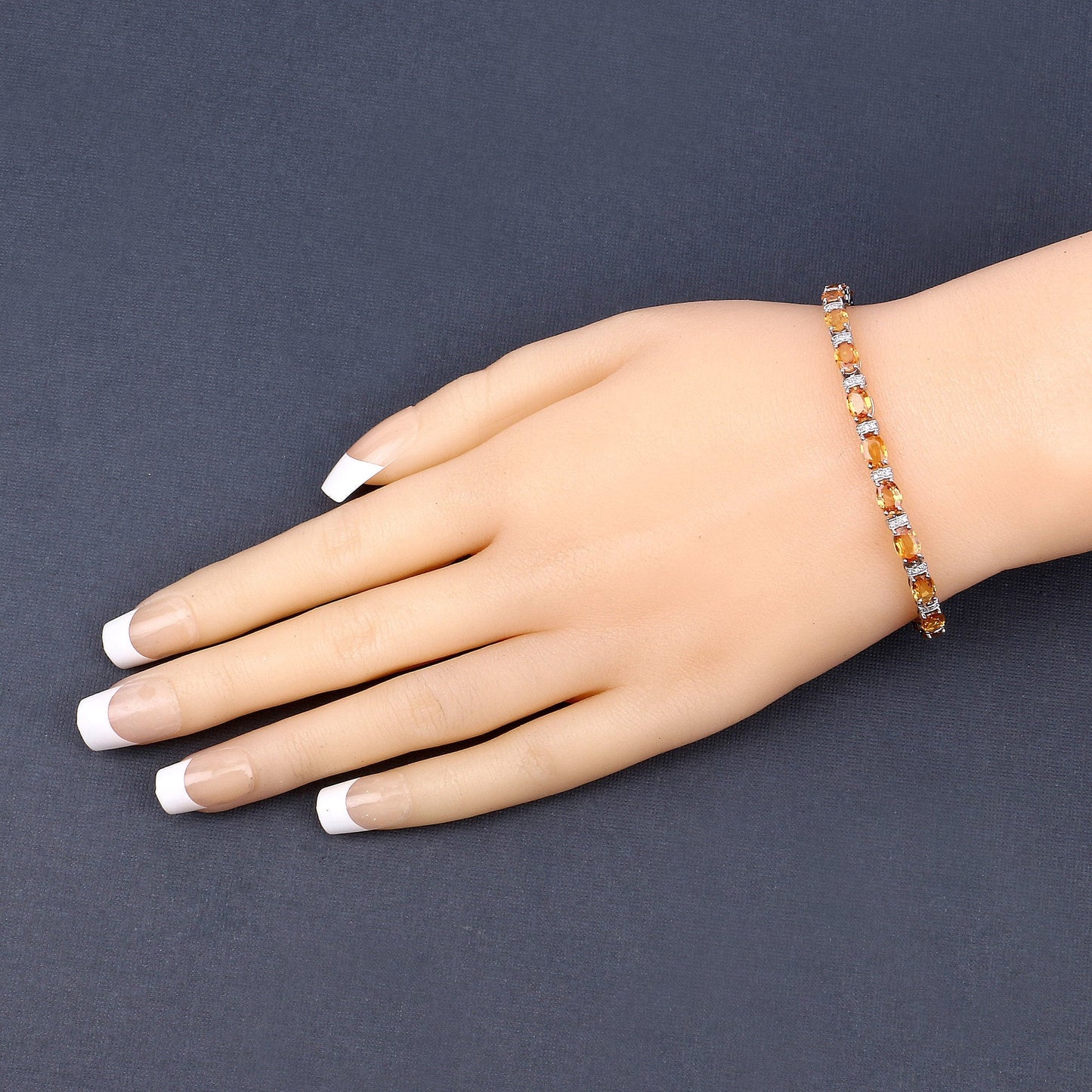 16.73 Carat Genuine Orange Sapphire and White Diamond 14K White Gold Bracelet Bids.com