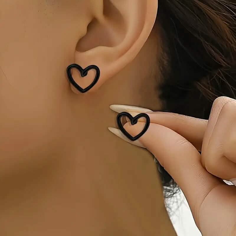 Glossy Hollow Heart Design Stud Earrings DailySale