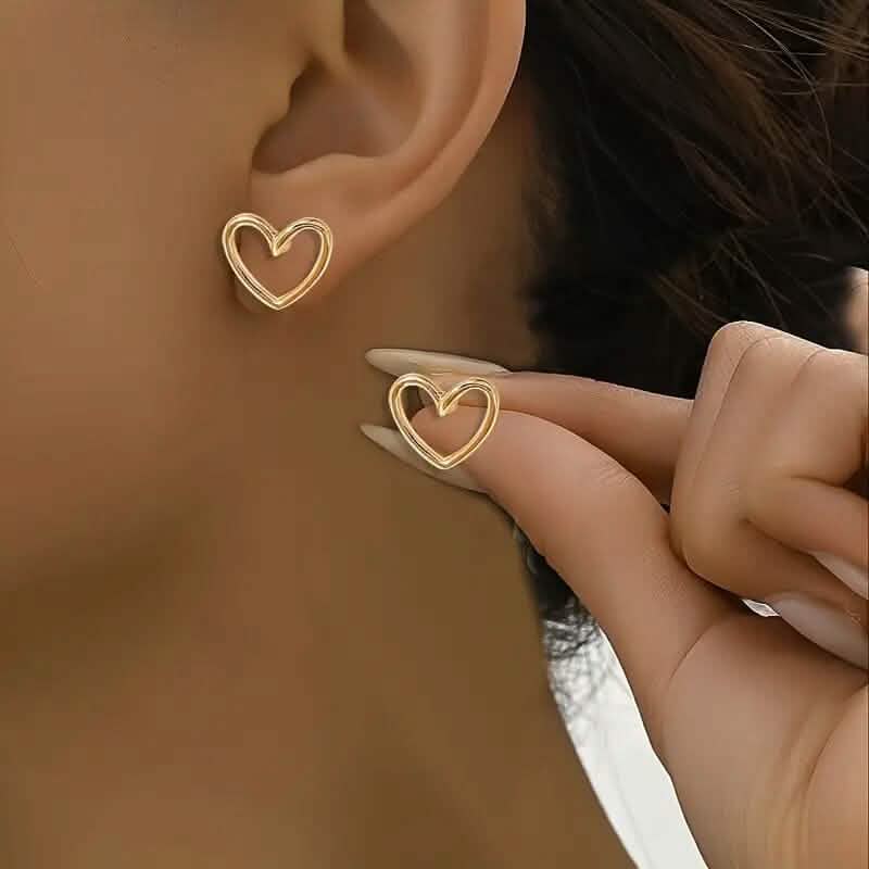 Glossy Hollow Heart Design Stud Earrings DailySale