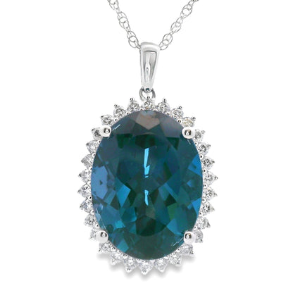 London Blue Topaz Fashion Pendants 14KT White Gold Bids.com