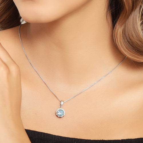 2.32 Carat Genuine Swiss Blue Topaz and White Diamond 14K Yellow Gold with .925 Sterling Silver Pendant Bids.com