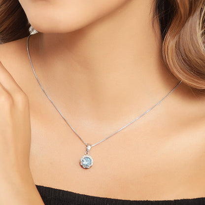 2.32 Carat Genuine Swiss Blue Topaz and White Diamond 14K Yellow Gold with .925 Sterling Silver Pendant Bids.com