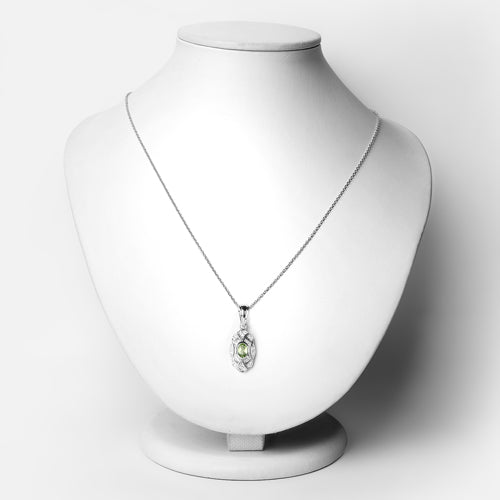 0.55 Carat Genuine Peridot and White Topaz .925 Sterling Silver Pendant Bids.com