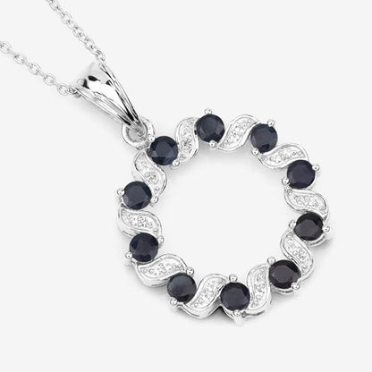 1.30 Carat Genuine Blue Sapphire and White Topaz .925 Sterling Silver Pendant Bids.com