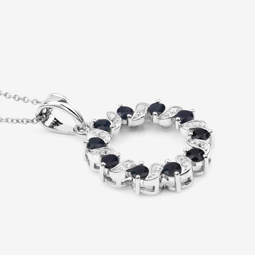1.30 Carat Genuine Blue Sapphire and White Topaz .925 Sterling Silver Pendant Bids.com