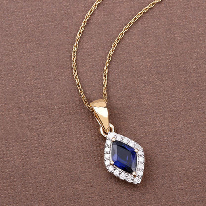 0.92 Carat Genuine Blue Sapphire and White Diamond 14K Yellow Gold Pendant Bids.com