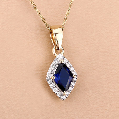 0.92 Carat Genuine Blue Sapphire and White Diamond 14K Yellow Gold Pendant Bids.com