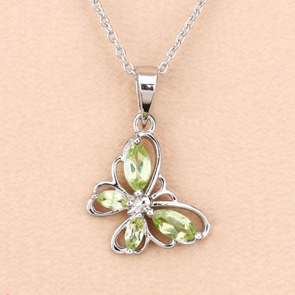 0.64 Carat Genuine Peridot .925 Sterling Silver Pendant Bids.com