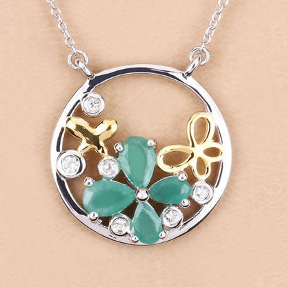 1.35 Carat Genuine Emerald and White Topaz .925 Sterling Silver Pendant Bids.com
