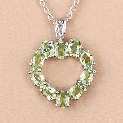 1.70 Carat Genuine Peridot .925 Sterling Silver Pendant Bids.com