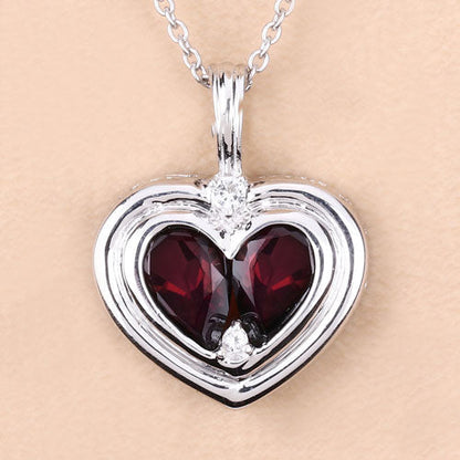 2.66 Carat Genuine Garnet and White Topaz .925 Sterling Silver Pendant Bids.com