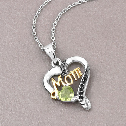 0.49 Carat Genuine Peridot and Black Spinel .925 Sterling Silver Pendant Bids.com