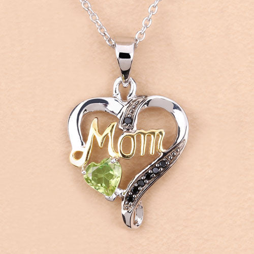 0.49 Carat Genuine Peridot and Black Spinel .925 Sterling Silver Pendant Bids.com