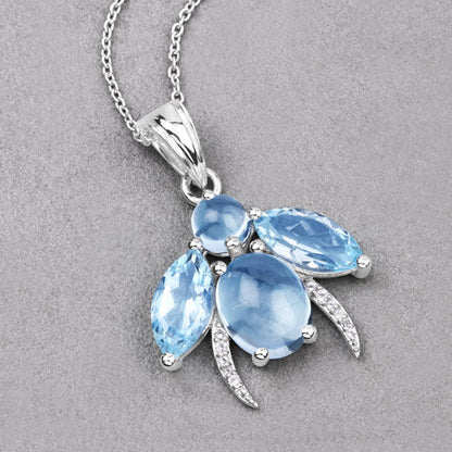 9.06 Carat Genuine Blue Topaz and White Topaz .925 Sterling Silver Pendant Bids.com