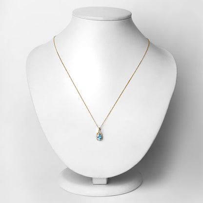 0.89 Carat Genuine Swiss Blue Topaz and White Diamond 14K Yellow Gold Pendant Bids.com