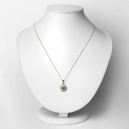 0.31 Carat Genuine Tanzanite and White Diamond 14K Yellow Gold Pendant Bids.com