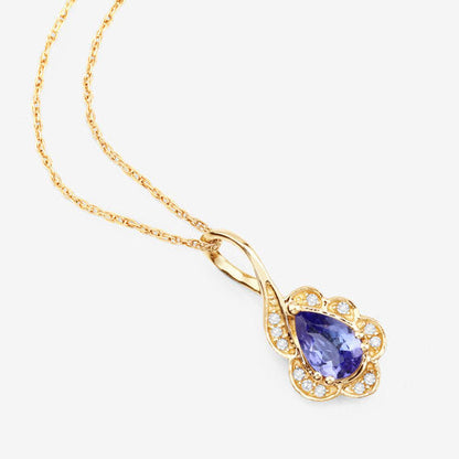 0.40 Carat Genuine Tanzanite and White Diamond 14K Yellow Gold Pendant Bids.com