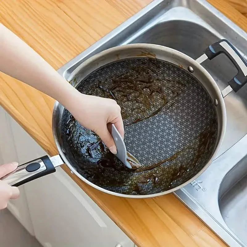Penguin-shaped Soft Kitchen Stain Scraper Tool DailySale