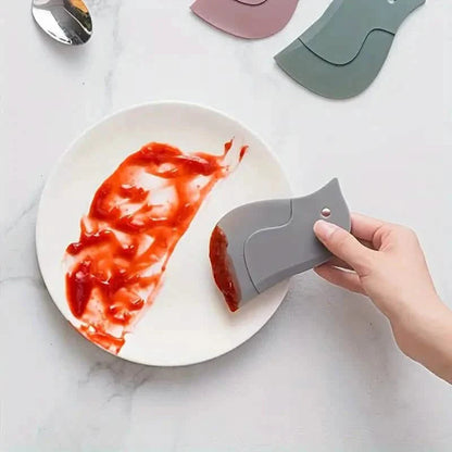 Penguin-shaped Soft Kitchen Stain Scraper Tool DailySale