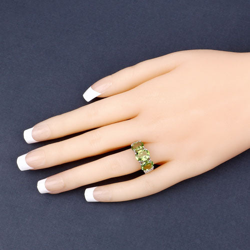 4.14 Carat Genuine Peridot and White Topaz .925 Sterling Silver Ring Bids.com