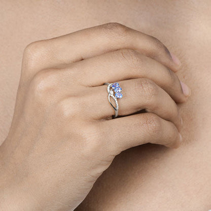 0.56 Carat Genuine Tanzanite and White Diamond 14K White Gold Ring Bids.com