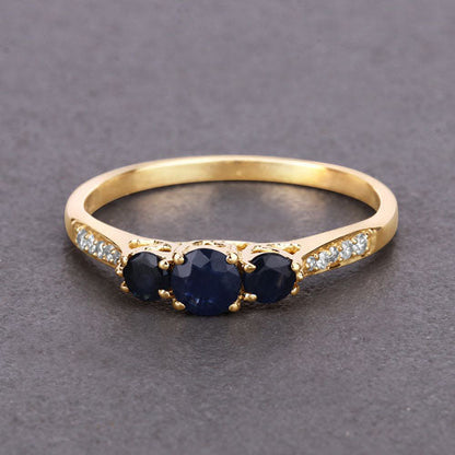 0.56 Carat Genuine Blue Sapphire and White Diamond 14K Yellow Gold Ring Bids.com
