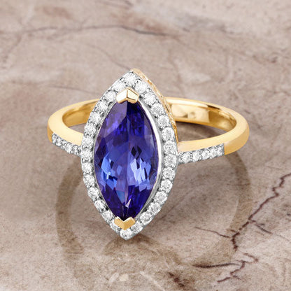 2.33 Carat Genuine Tanzanite and White Diamond 14K Yellow Gold Ring Bids.com