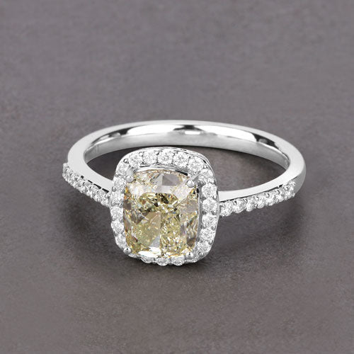 IGI Certified 2.05 Carat Genuine Light Yellow Diamond Center and 0.29cttw White Diamond 18K White Gold Ring (2.34cttw) Bids.com