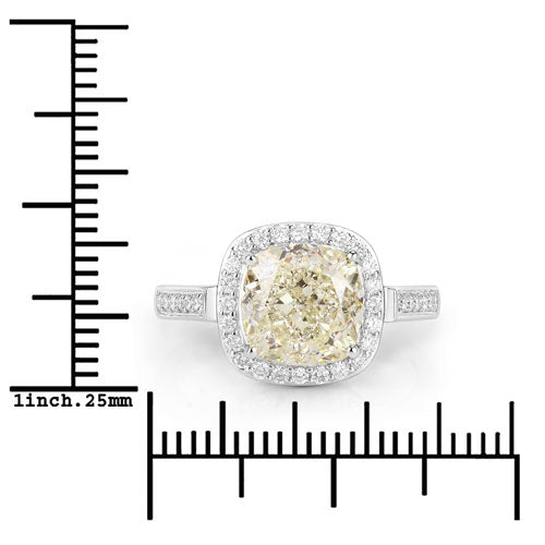 IGI Certified 4.02 Carat Genuine Light Yellow Diamond Center and 0.36cttw White Diamond 18K White Gold Ring (4.38cttw) Bids.com