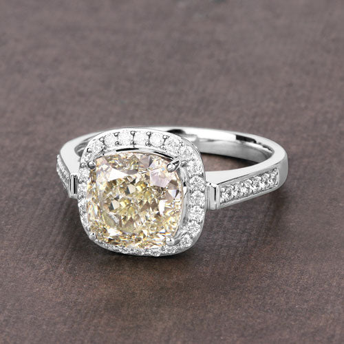 IGI Certified 4.02 Carat Genuine Light Yellow Diamond Center and 0.36cttw White Diamond 18K White Gold Ring (4.38cttw) Bids.com